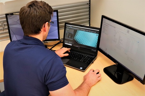 The Technology House team member working on CAD designs